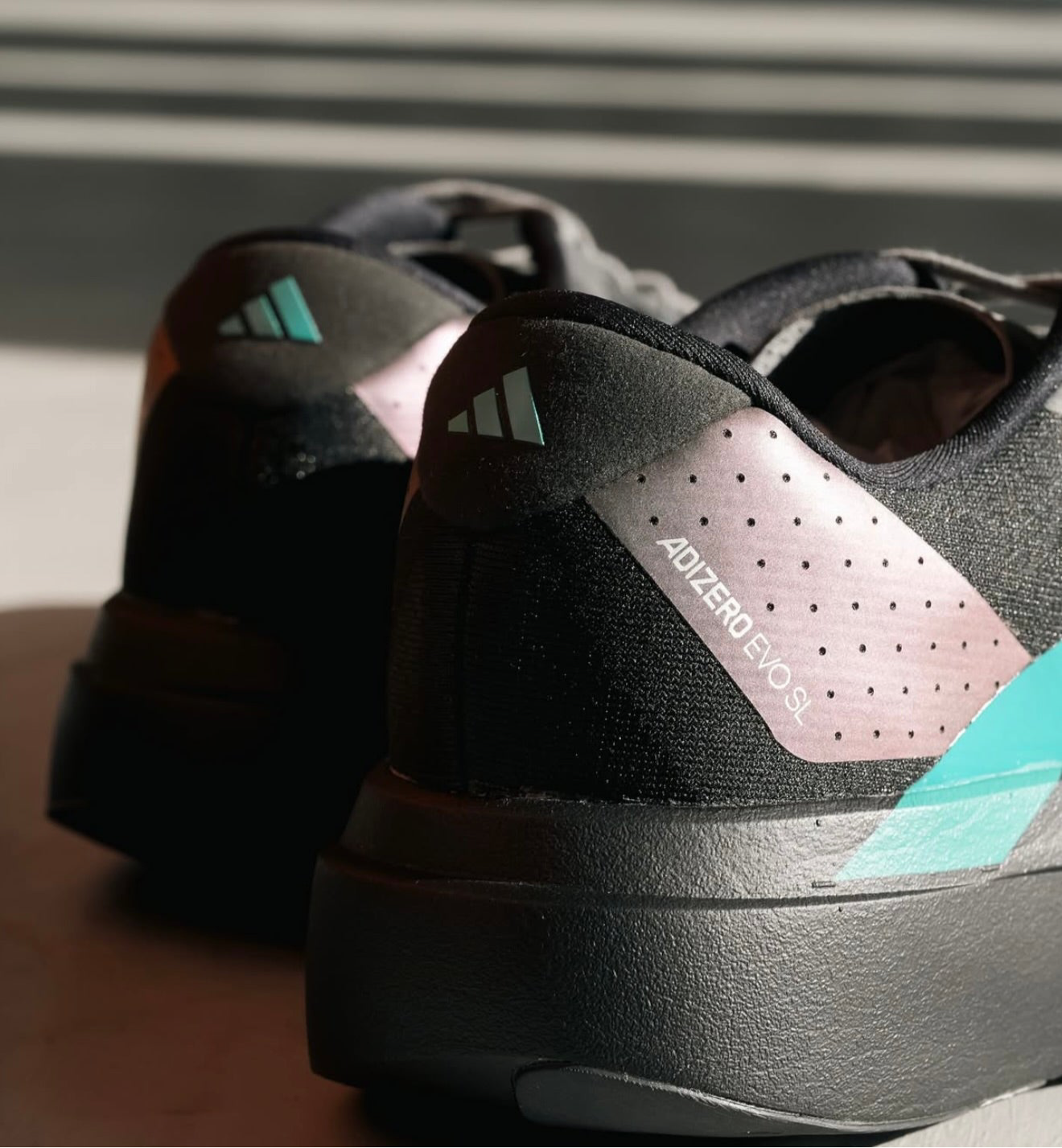 Adizero Evo SL Black Pure Teal