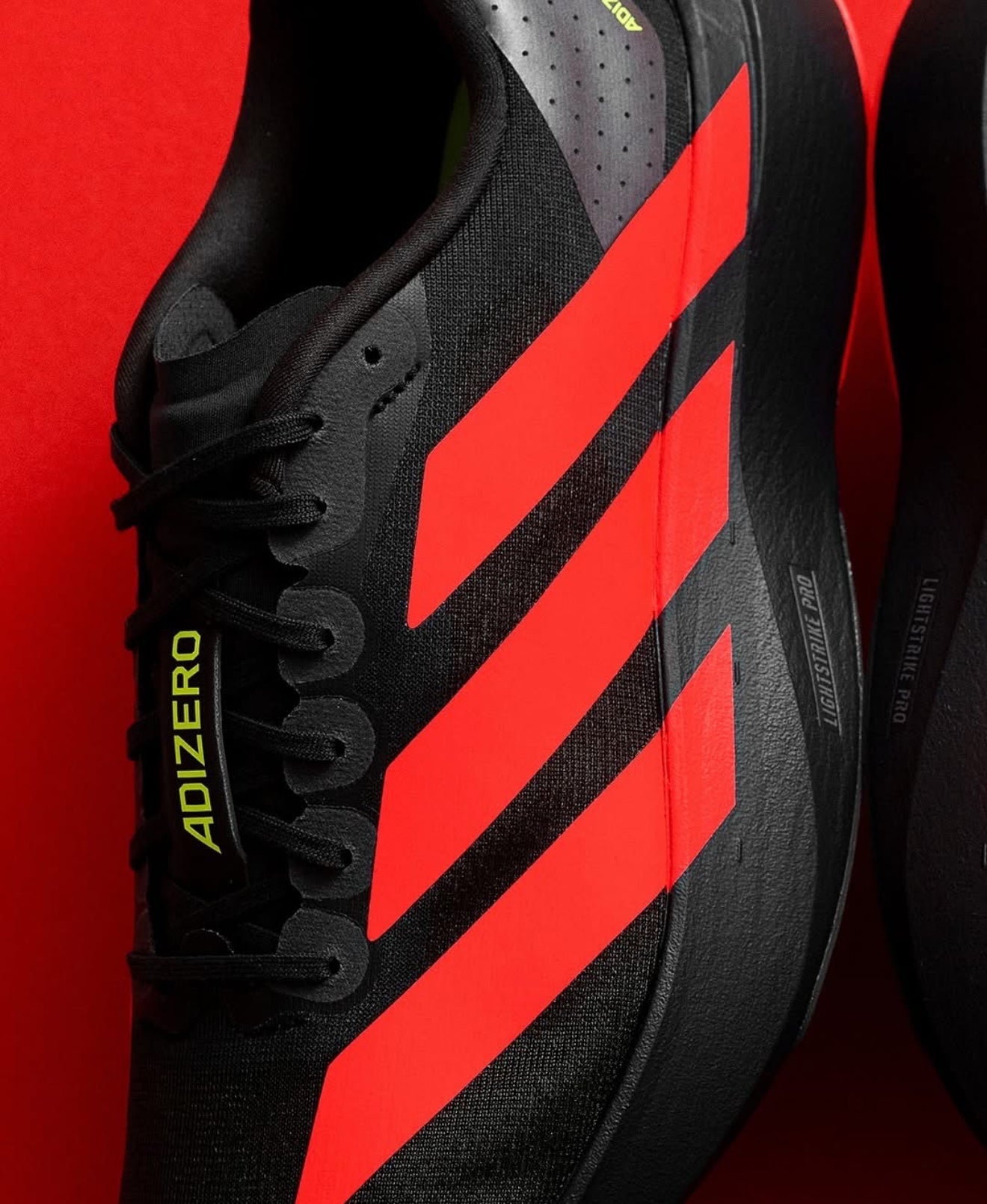 Adizero Evo SL Carbon Lucid Red