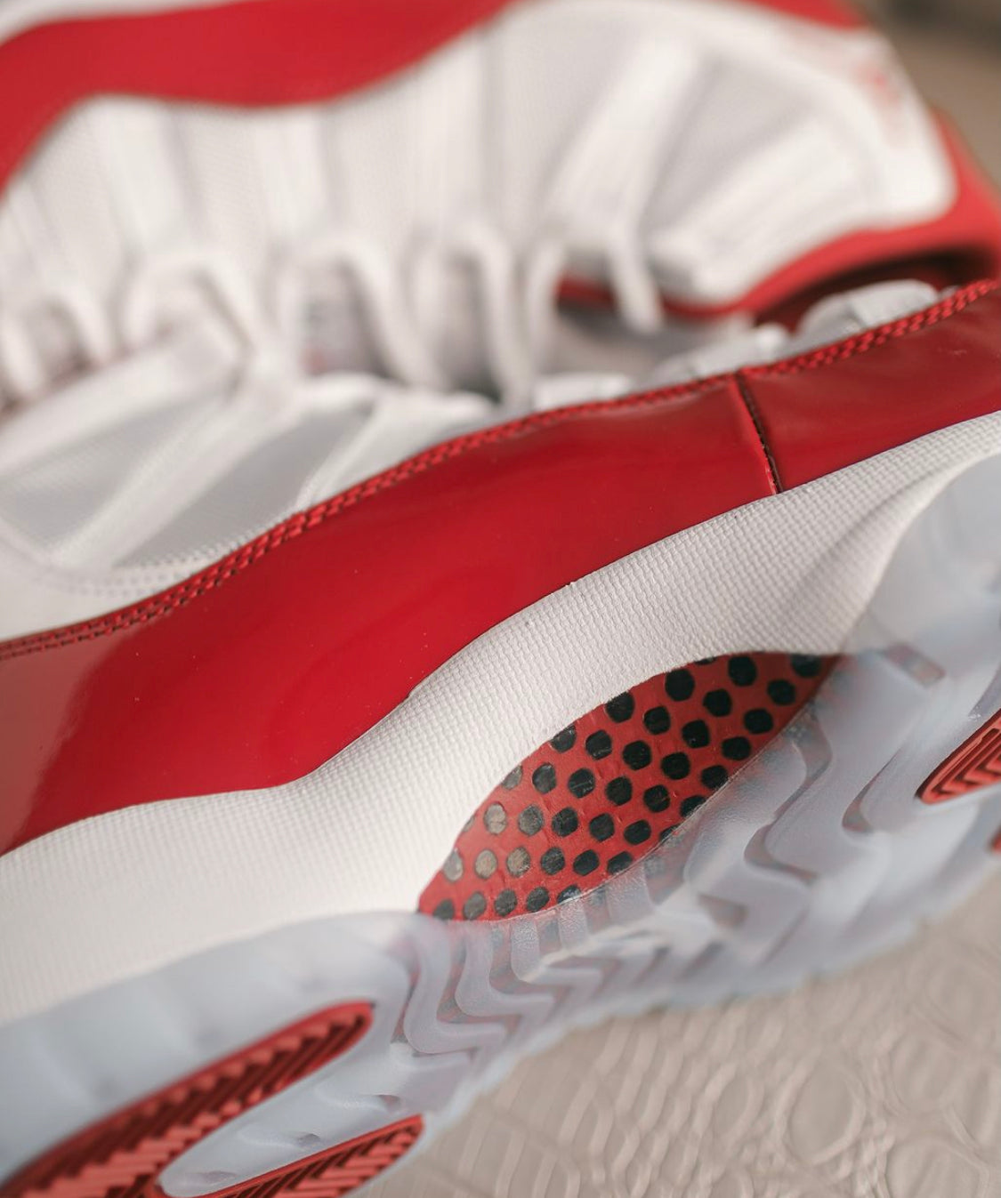 Air Jordan 11 “ Cherry / Varsity Red “