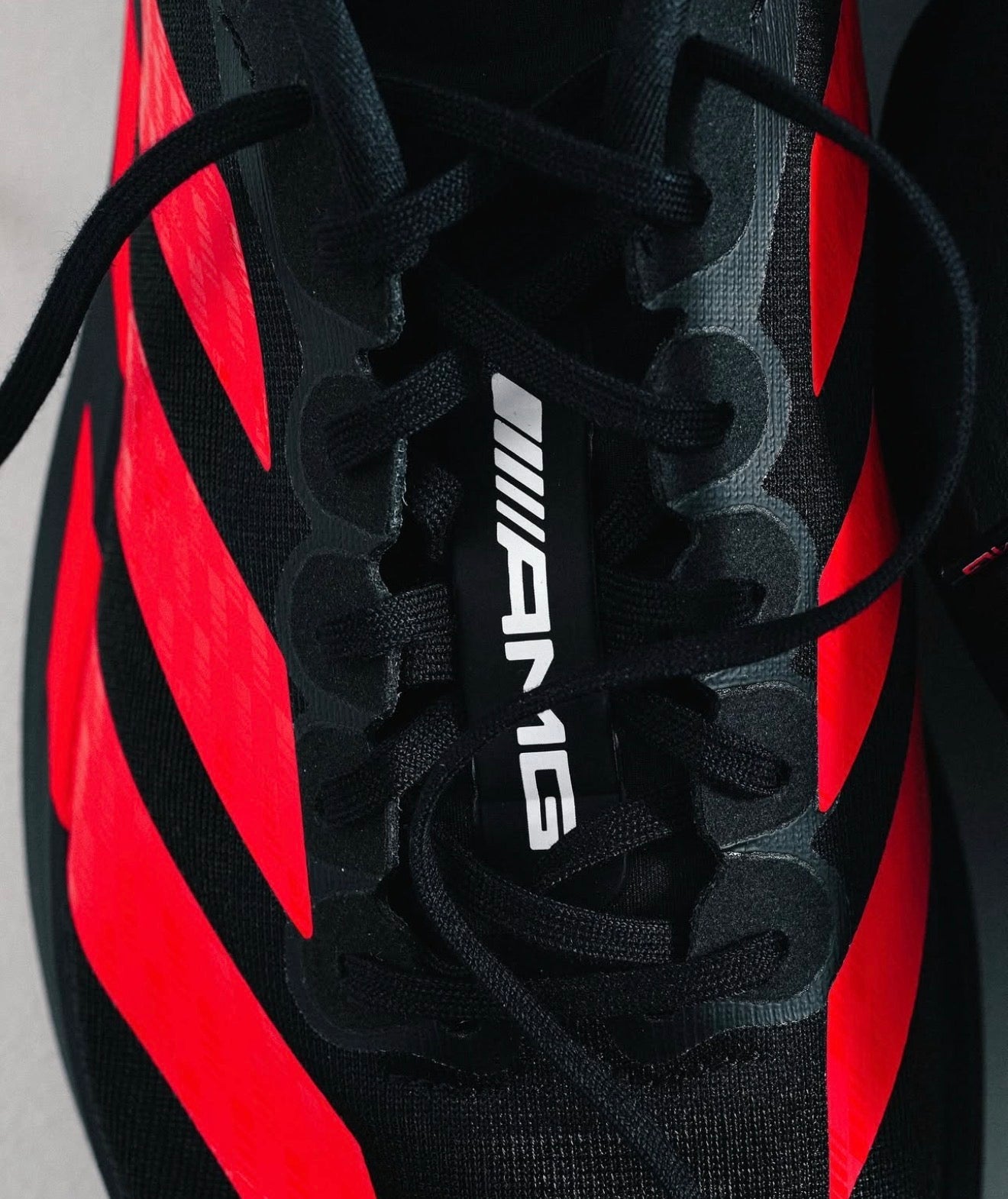 Adizero Adios Pro 4 Mercedes AMG Black Lucid Red