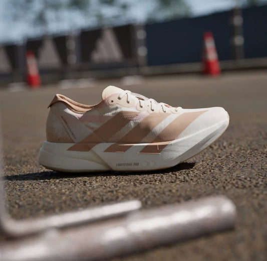 WMNs Adizero Adios Pro 4 Chalk White Warm Sandstone Semi Impact Orange