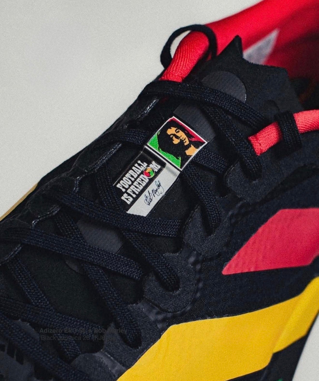 Adizero Evo SL Bob Marley Black
