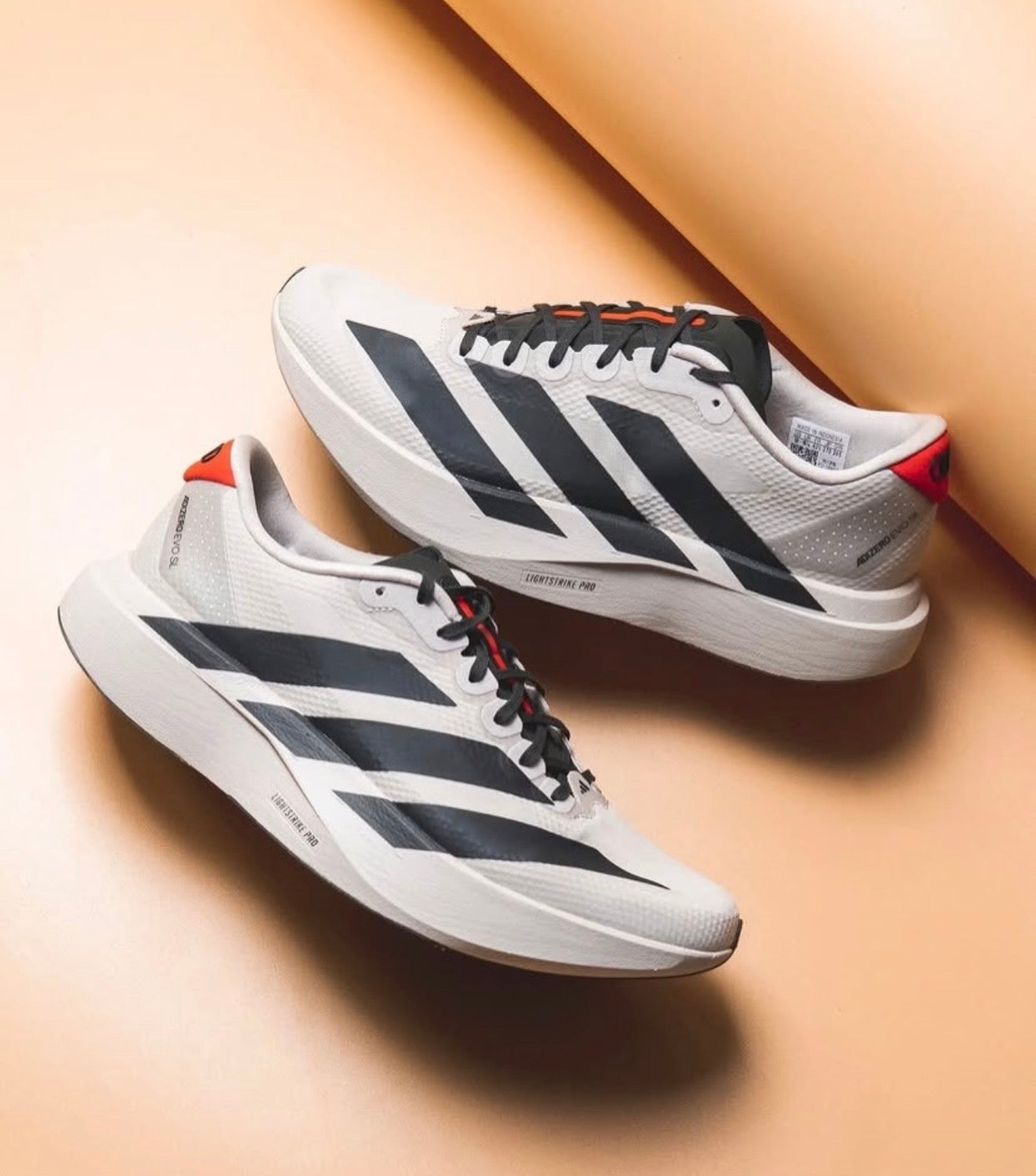 Adizero Evo SL Woven Audi Revolut F1 Team Chalk Pearl Black