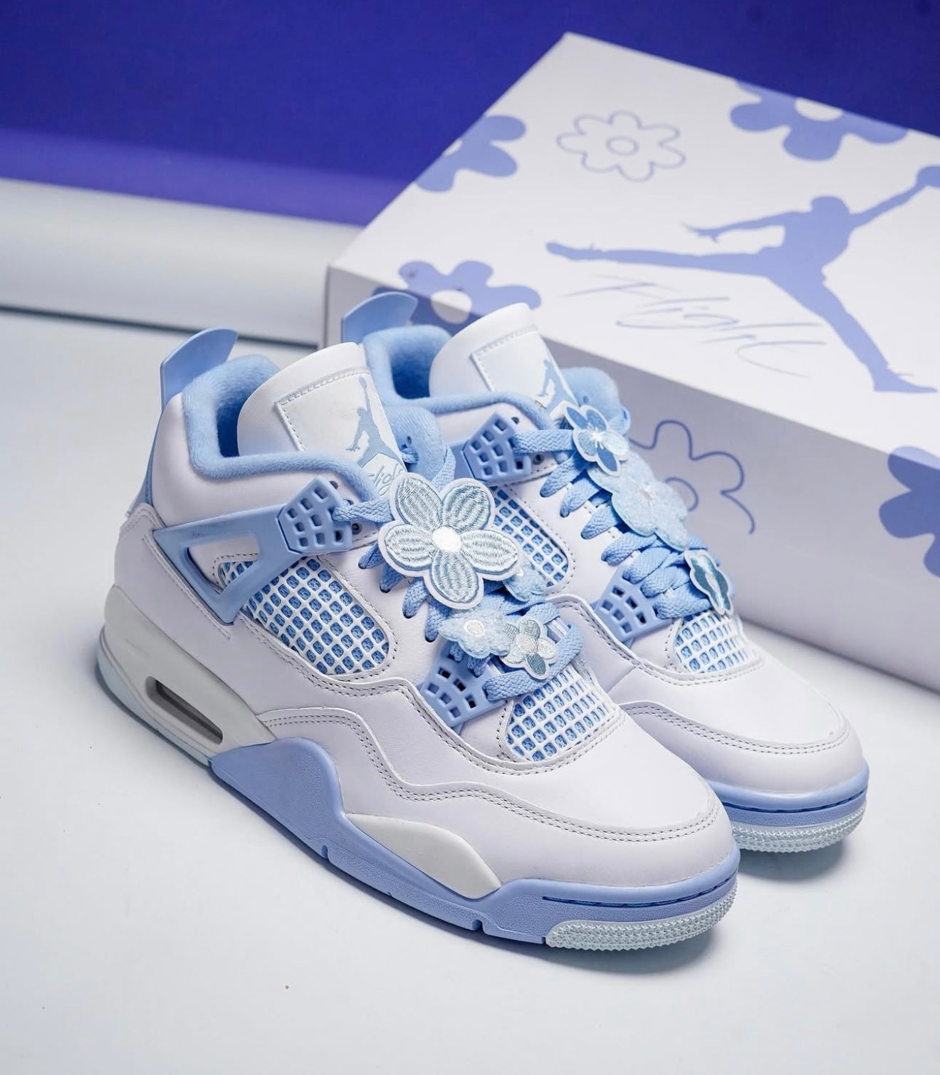 WMNs Air Jordan 4 Retro Forget Me Not