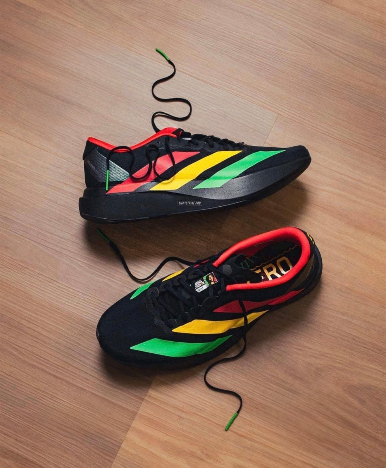 Adizero Evo SL Bob Marley Black