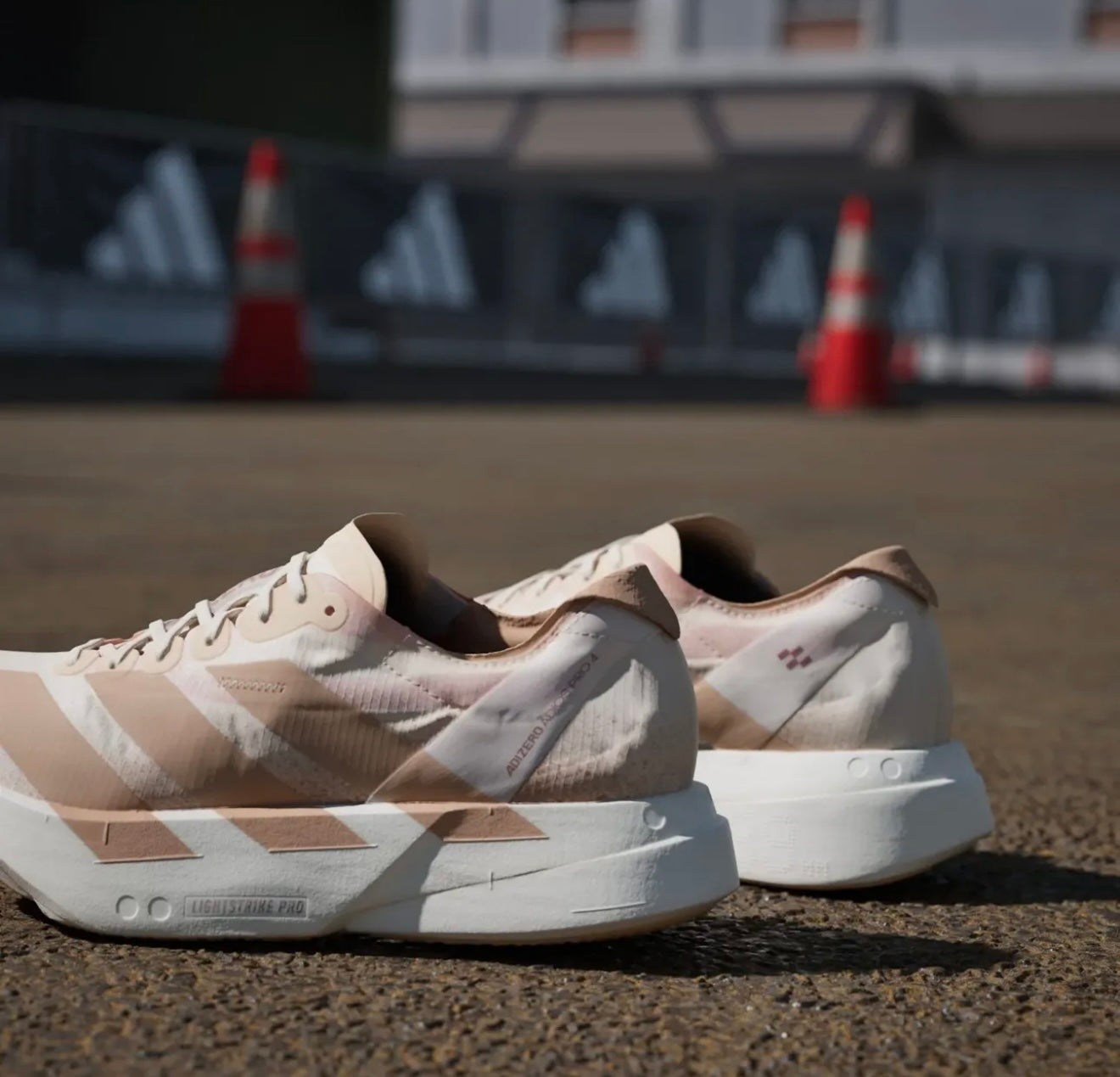WMNs Adizero Adios Pro 4 Chalk White Warm Sandstone Semi Impact Orange
