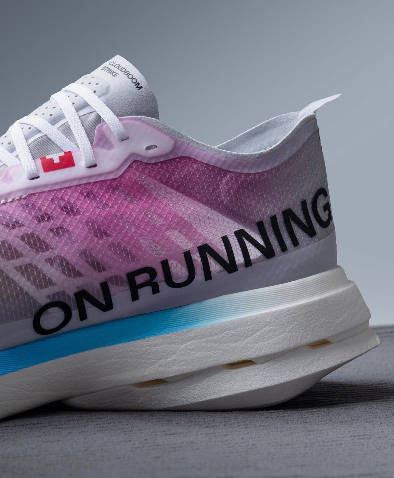 On Running Cloudboom Strike White Horizon