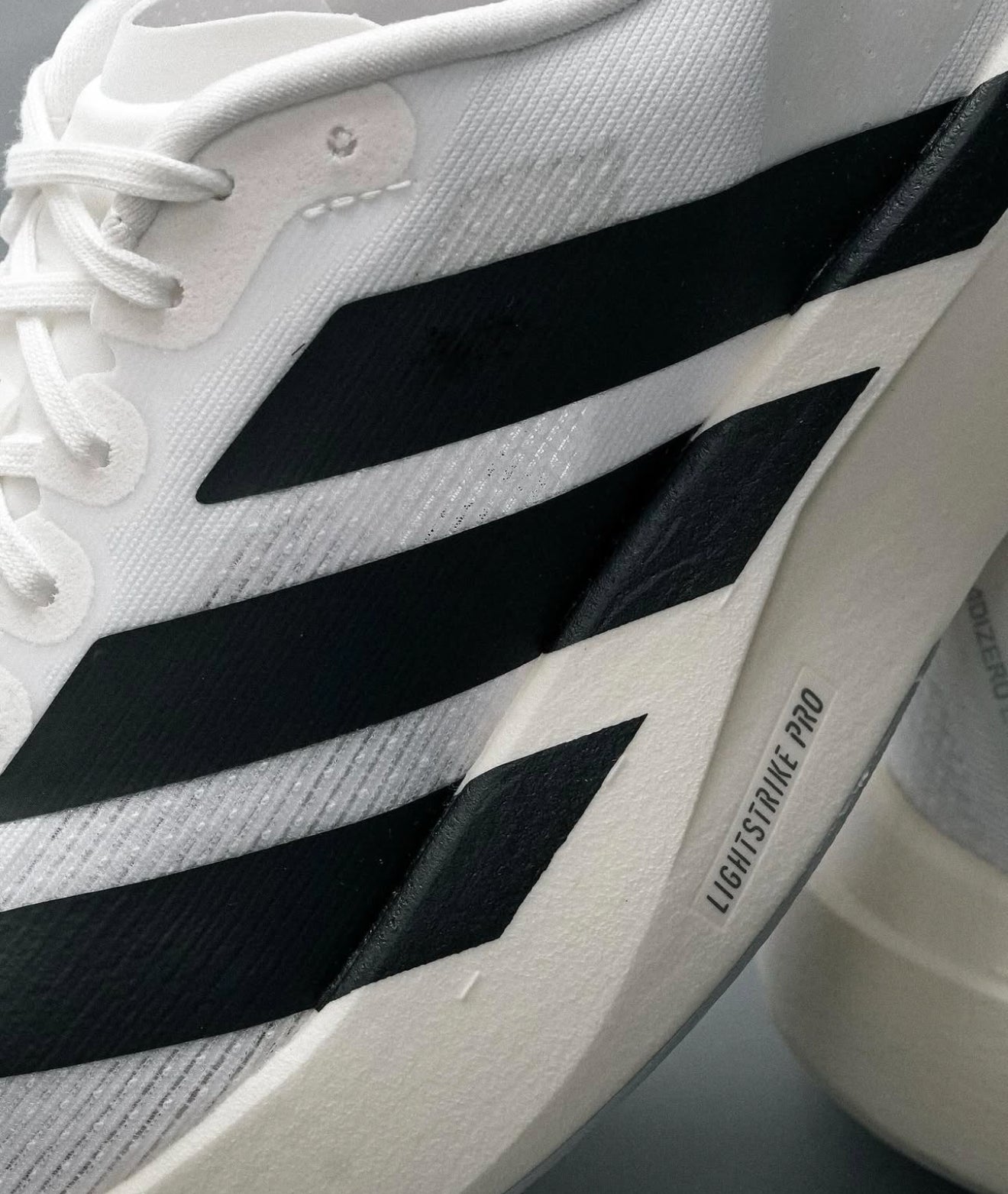 WMNs Adizero Evo SL White Black