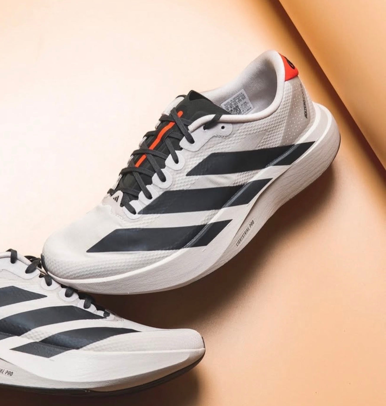 Adizero Evo SL Woven Audi Revolut F1 Team Chalk Pearl Black