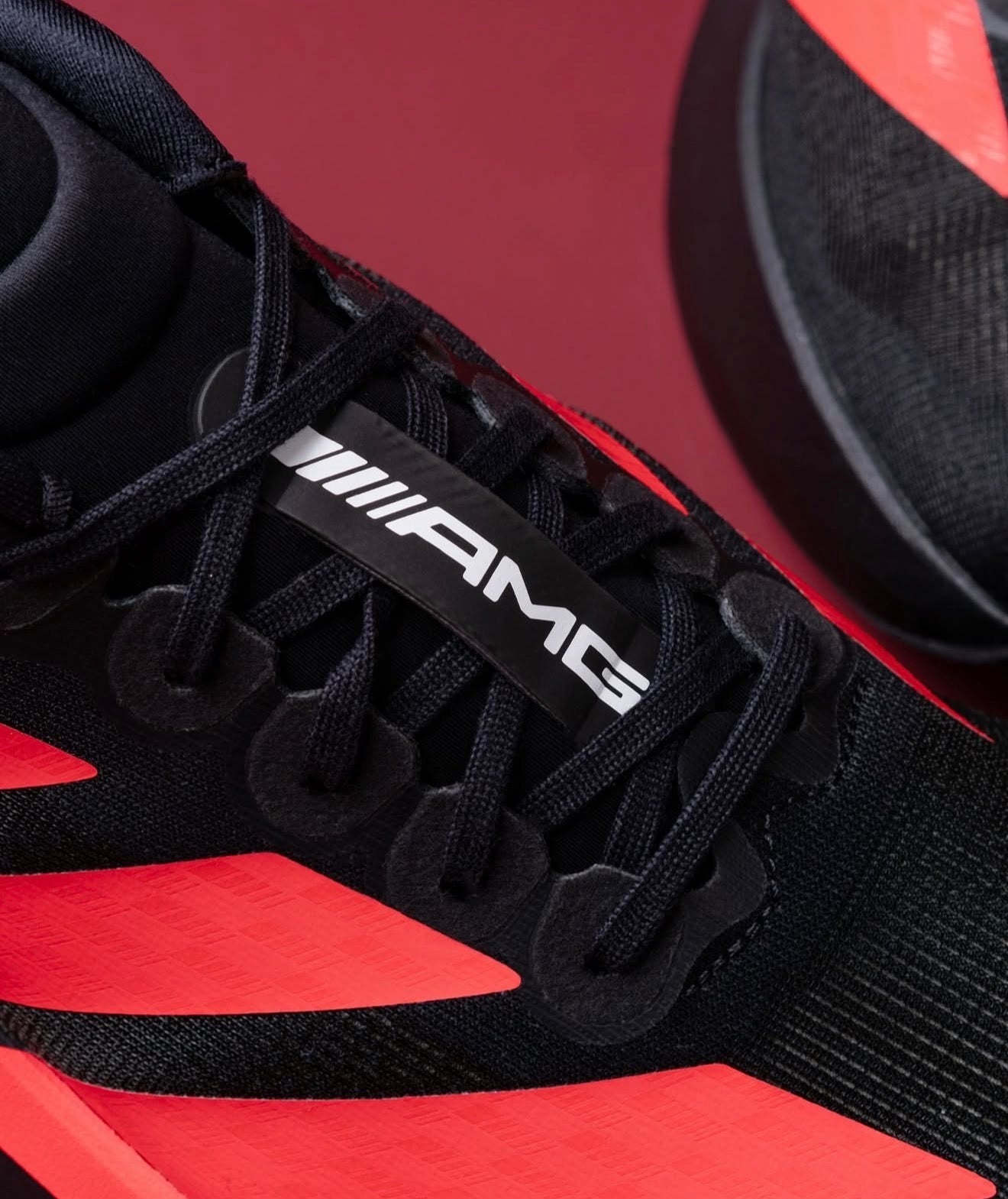 Adizero Evo SL Mercedes AMG Black Lucid Red