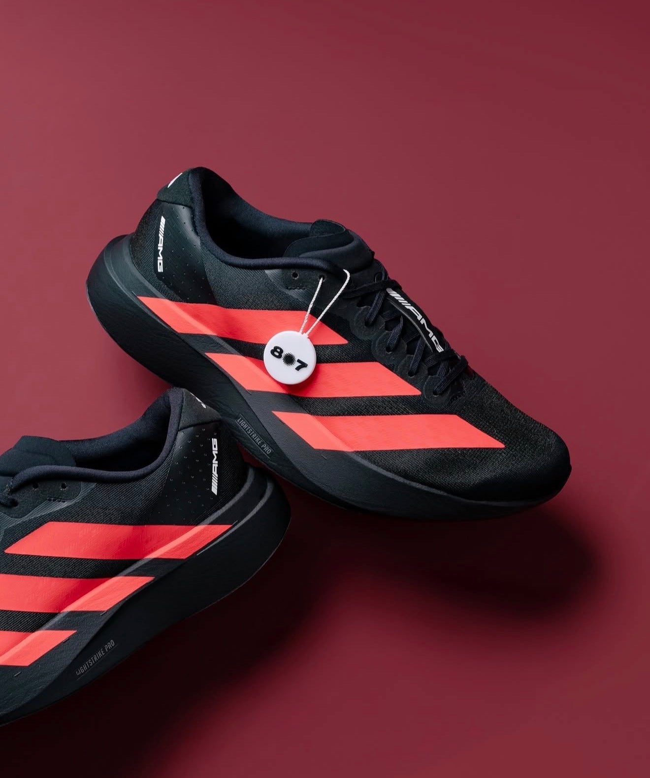 Adizero Evo SL Mercedes AMG Black Lucid Red