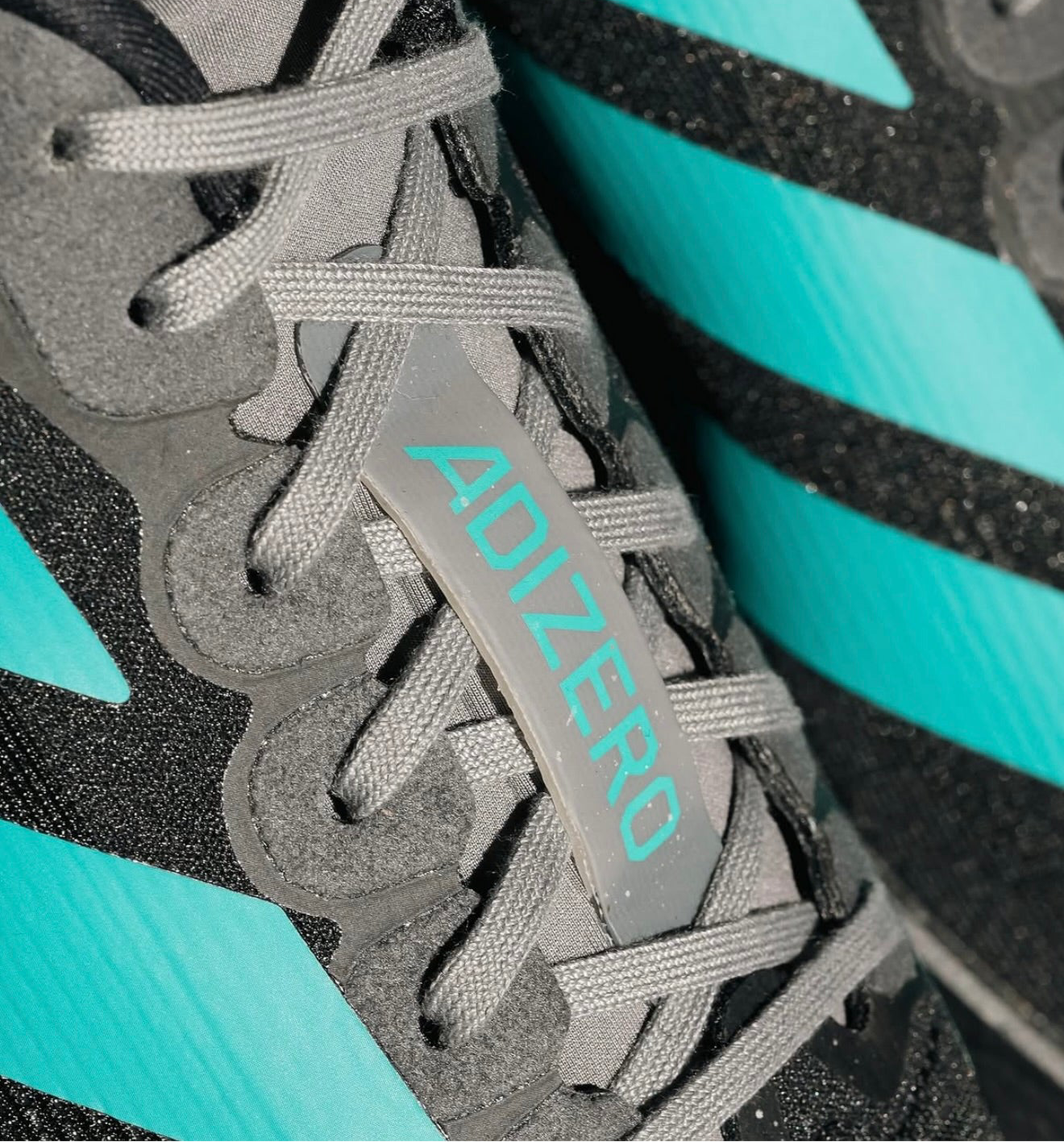Adizero Evo SL Black Pure Teal