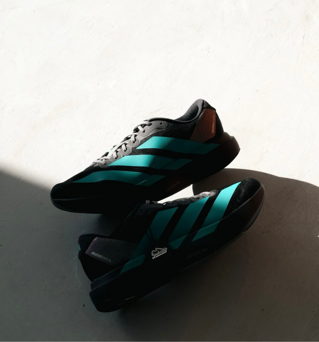 Adizero Evo SL Black Pure Teal