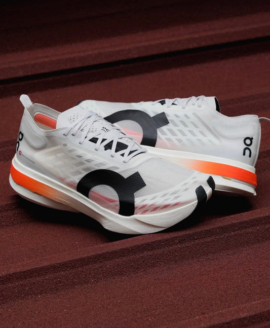 On Running Cloudboom Strike White Black Orange