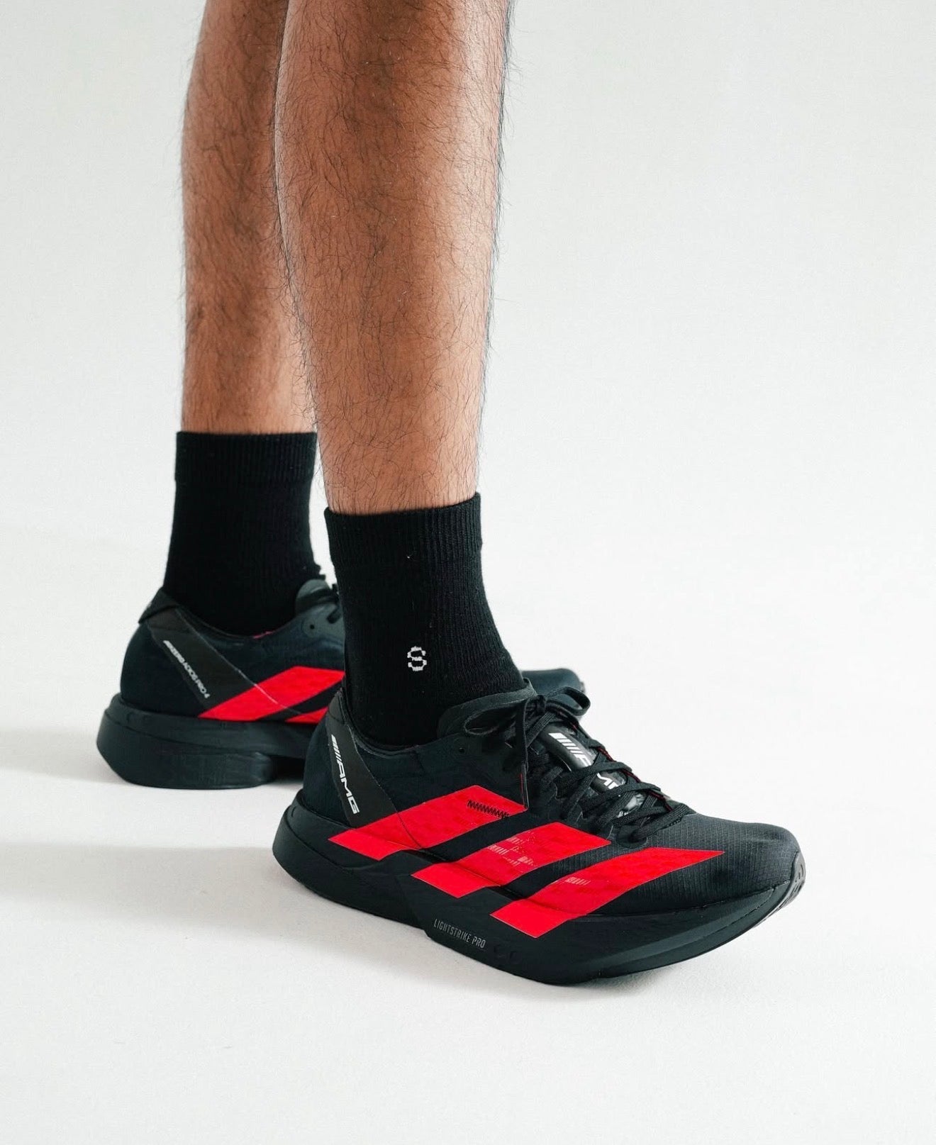 Adizero Adios Pro 4 Mercedes AMG Black Lucid Red