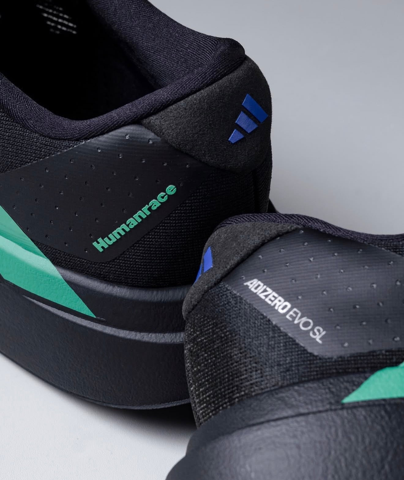 Adizero Evo SL Pharrell Humanrace Black Green Blue
