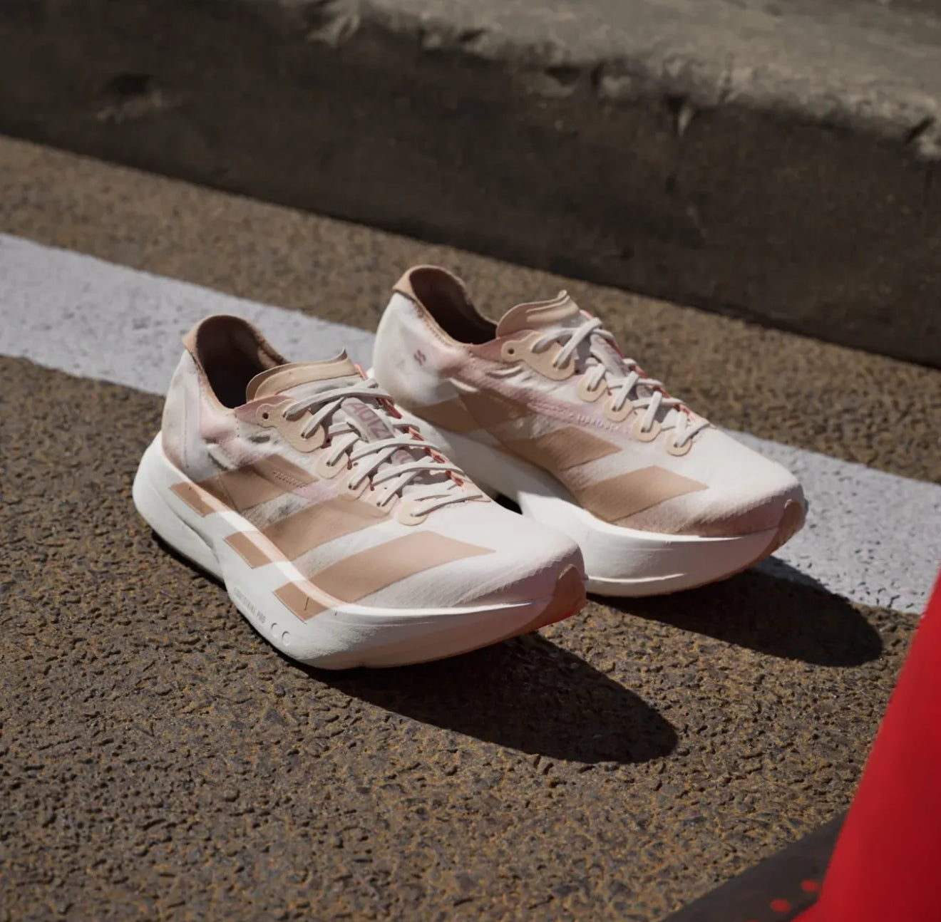 WMNs Adizero Adios Pro 4 Chalk White Warm Sandstone Semi Impact Orange